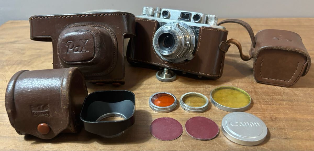 Canon フィルムカメラ　カバー付き　昭和レトロ　ジャンク品 キャノン フィルム一眼レフカメラCanon EX AUTO ジャンク 昭和