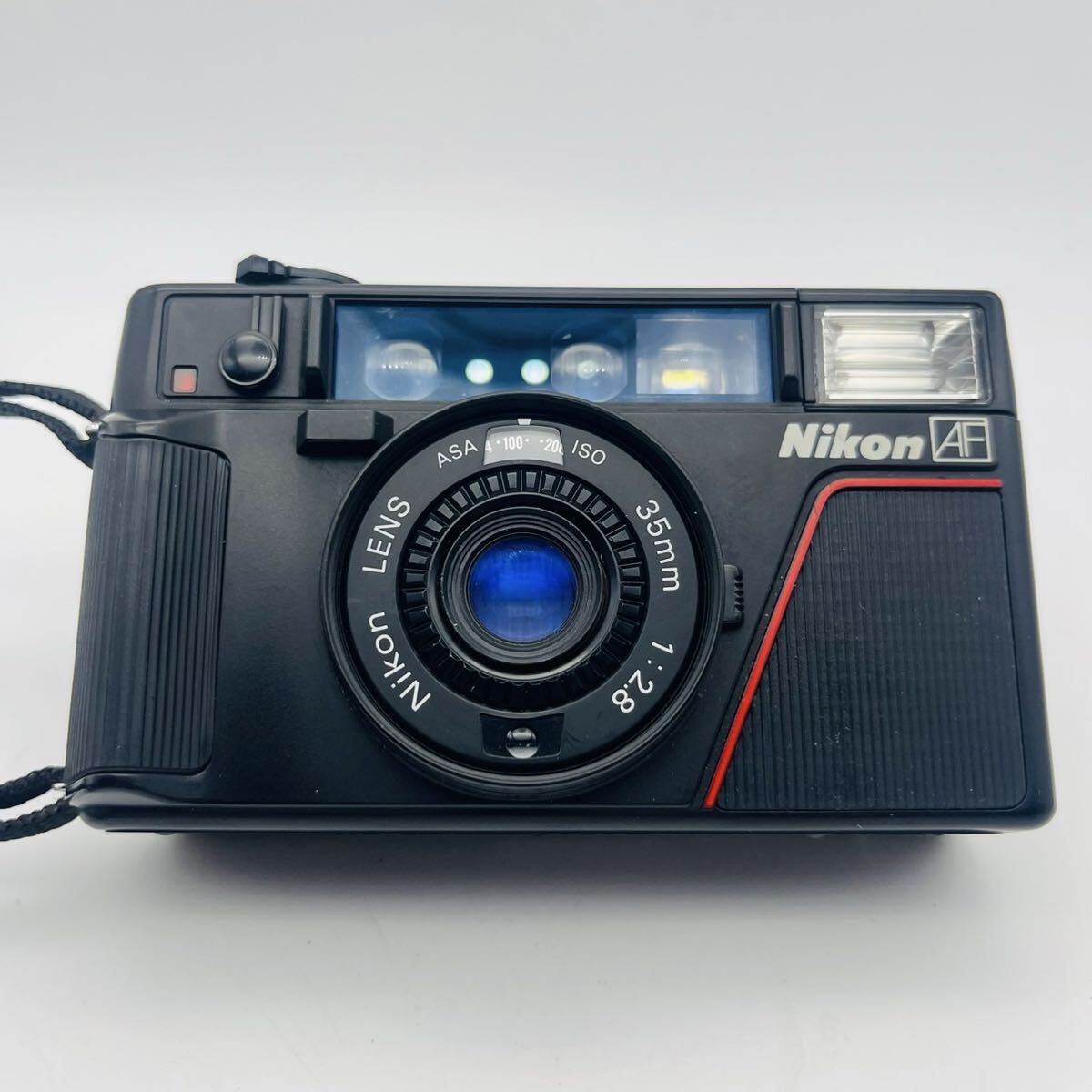 ⭐︎ Nikon ニコン フィルムカメラ L35AFレンズ 35mm 1:2.8 ニッコール千夜一夜物語 - 第三十三夜 | Enjoyニコン | ニコン