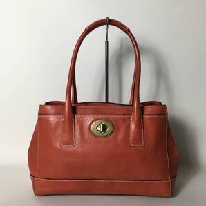 79B47|コーチ ハンドバッグ レザー レッド ターンロック