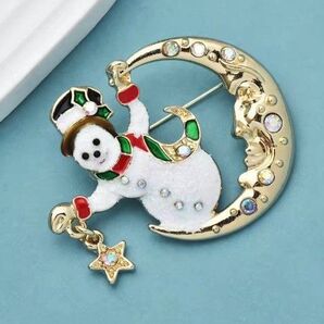 ブローチ 月と雪だるま クリスマス キラキラ キュート ロマンチック かわいい 可愛い ジルコニア ラインストーン ピン