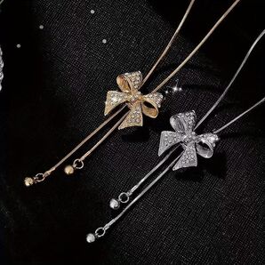 Eclore Noel Collection リボンモチーフ ロングネックレス 18K仕上げ ラインストーン 上品 高級感 秋冬 クリスマス ギフト レディース