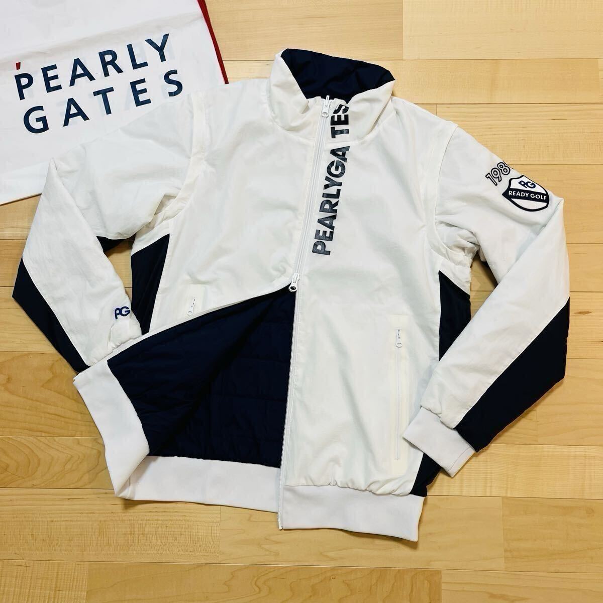 【美品】パーリーゲイツ XL相当 スニード リバーシブルブルゾン 刺繍 25周年 FTY×Nyストレッチリップストップ リバーシブル中綿ブルゾン