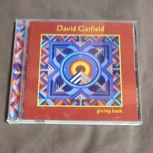 David Garfield giving back CD