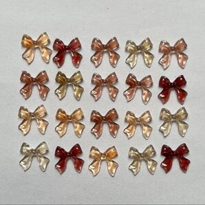 【まとめ割引あり】ネイルパーツ 20個 リボン クリア ブラウン