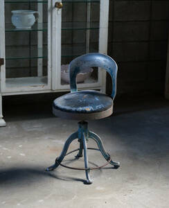  old castings iron legs. rotation chair / old furniture antique chair retro old furniture industry series in dust real 