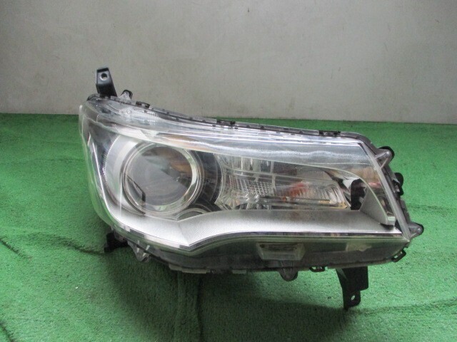 ekスペース B11W HID ヘッドライト 右 STANLEY W1048 三