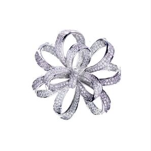 スワロフスキークリスタル リボンブローチジルコンコサージュ結婚式卒業式入学式 フラワー ブローチお誕生日記念日母の日クリスマス贈り物