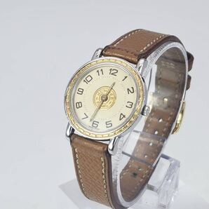 HERMES エルメス セリエ 腕時計 クォーツ レディース アイボリー文字盤 2針 純正レザーベルト 刻印有り ゴールド シルバー コンビ