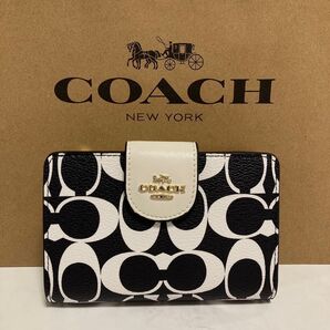 新品 COACH 長財布 コーチ 二つ折り財布 レディース メンズ シグネチャー ブラック ホワイト モノトーン