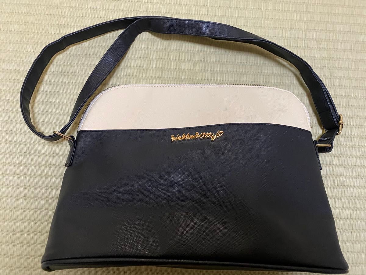 ハローキティ　ショルダーバッグ　黒　ベージュ　バイカラー　合皮　フェイクレザー　肩掛け ブラック 斜めがけ