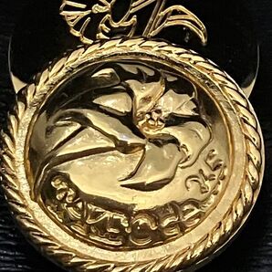 タケオニシダショルダーバッグハンドバッグ両方お使い頂けます。ゴールド金具が花のデザイン。半回転して開閉デザイン