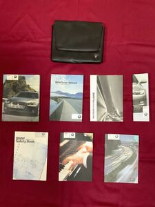 A122 used BMW 320i 3 series owner manual manual case attaching 