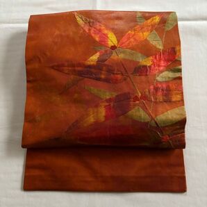 名古屋帯 名古屋仕立て 正絹 レンガ色 赤茶色 植物文様 秋冬色
