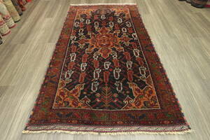 茶系のアンティークトライバルラグ　ペルシアンバルーチ絨毯　オールド手織り絨毯　ヴィンテージ　113x200cm　＃21