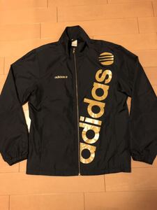 送料込み 男性 アディダス ネオ adidas NEOナイロンジャケット ウィンドブレーカー 黒×ゴールド M