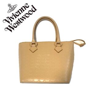 【送料無料】Vivienne Westwood ヴィヴィアンウエストウッド ハンドバッグ 巾着 クリーム 白 レディース オーブ 型押し