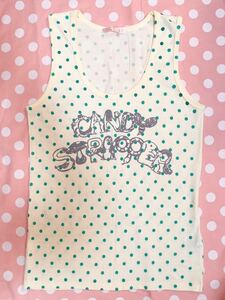 CANDYSTRIPPER can spa tank top polka dot pattern polka dot pattern tank top brand Logo Thai po graph . Logo animal Logo yellow color green polka dot 