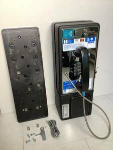  America public telephone machine coin un- necessary . general telephone machine as use possibility back plate attaching 
