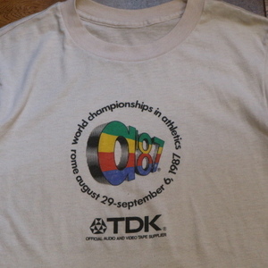 80s TDK a'87 Tシャツ ベージュ カセットテープ 企業 ロゴ USA イベント スポンサー 日本 ジャパン ノベルティ ヴィンテージ