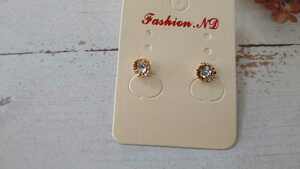 * unused * Gold color × clear biju-* earrings *