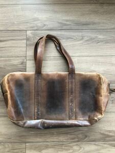 TALKING ABOUT THE ABSTRACTIONto- King a bow toji Abu s traction tata leather bag 