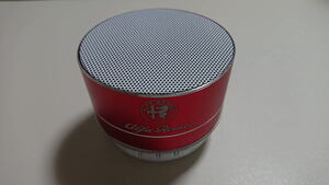 [1 point only ] Alpha Romeo present white Logo type wireless Bluetooth portable small size speaker body color : red 