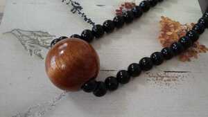 * piece ..& presence * large wood ball * black beads necklace *