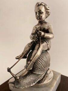Cupid sitting astride a snail's shell,1920s silvered bronze FRANCE.katatsumli.... angel very unusual mascot..