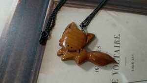 * with translation * fox motif × wooden * necklace *