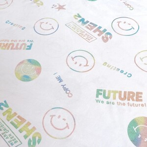 Tシャツニット生地 レインボー ニコチャン柄