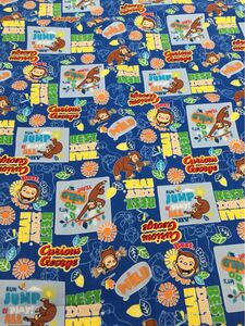 おさるのジョージ コミック柄(ブルー)綿100% 約108cm巾×50cm オックス生地 日本製 入園入学準備 ハギレ