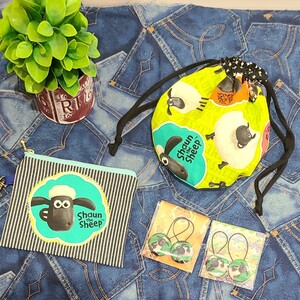 ハンドメイド まんまる巾着袋 ポーチ ヘアゴム ひつじのショーン