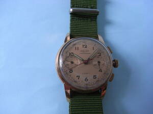 e two car chronograph * hand winding. day difference 30 second. adjusted .. used.