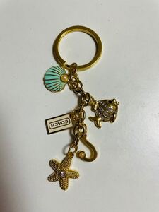 新品未使用 コーチ キーホルダー バッグチャーム パール