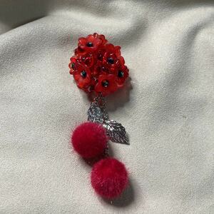  deep-red . fur ball .. flower. strap 