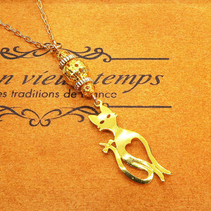  Smart . cat Silhouette motif ....meta ruby z. necklace Gold color 