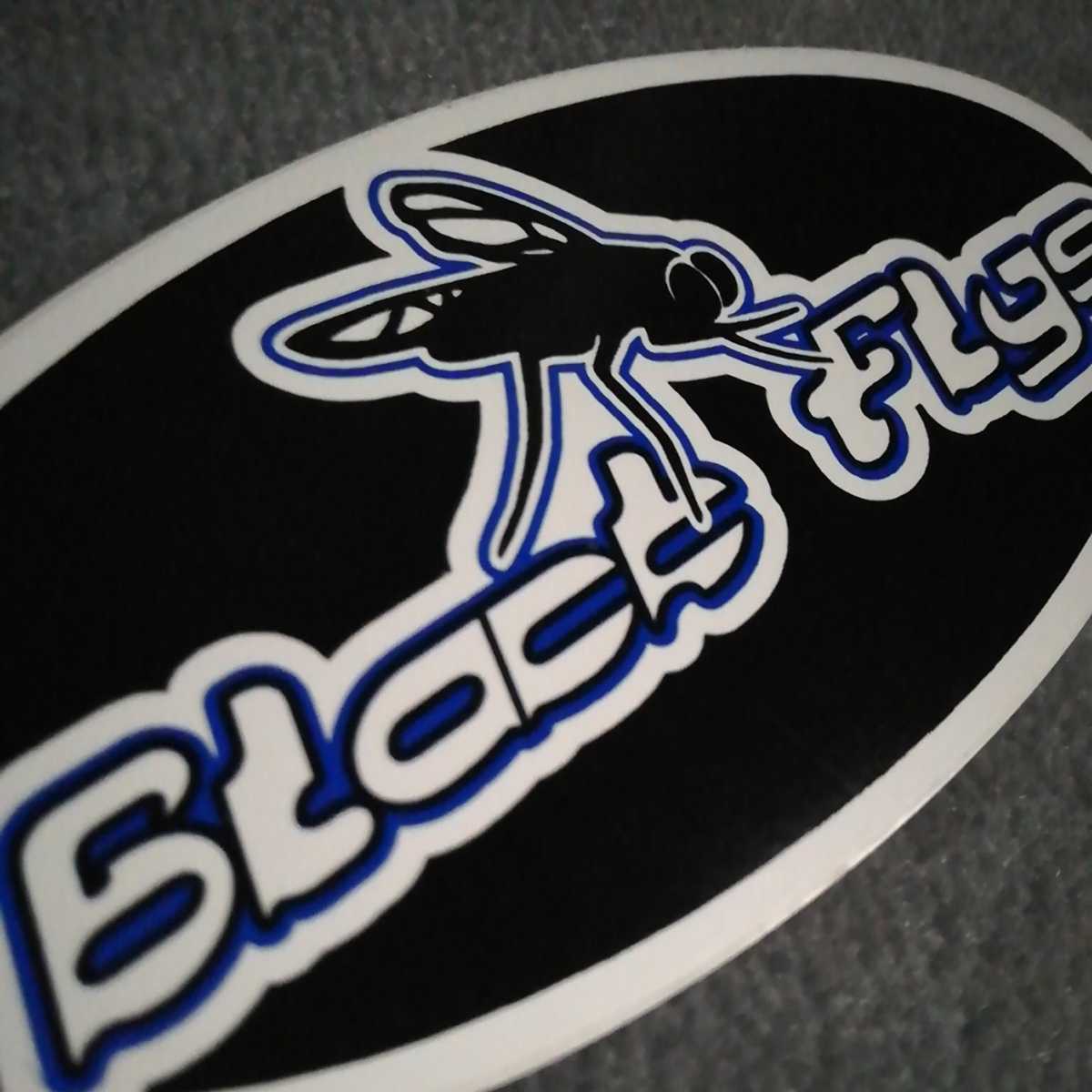 訳有新品未使用正規品本物BLACKFLYSブラックフライ非売品人気オーバルマークロゴステッカー黒/白/黒/青/白 横約14cm縦約6.4cm送料¥84~