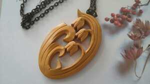 * wooden ×.... motif *... carving necklace city ak