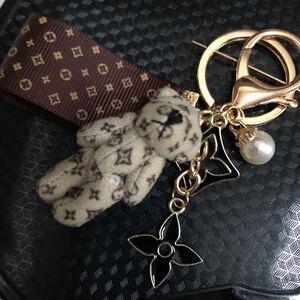 ☆☆☆ロゴ入りくまちゃん☆☆☆【バッグチャームorキーリング】◎◎◎フラワーパーツ&パール◎◎◎