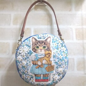 ハンドル付き ラウンドポーチ ハンドメイド【リバティ×コヤンイサムチョン】