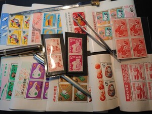 年賀切手 小型シートだるま、三春駒他七枚、切手羽根つき四枚、兎と少女二枚、龍虎二枚、赤べこ四枚