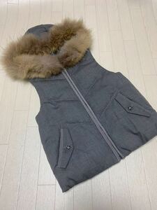  beautiful goods simplisite. raccoon fur down vest 