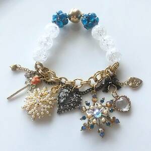 Betsey. snow flakes . Heart charm magnet bracele 1 point only 