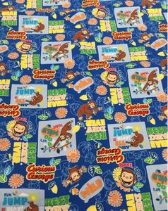 おさるのジョージ コミック柄(ブルー)綿100% 約108cm巾×100cm オックス生地 日本製 入園入学準備 ハギレ