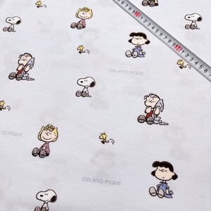特価 スヌーピー ミニ裏毛ニット 165×55cm ニット生地 Bow_matl fnr a21-25 布 はぎれ