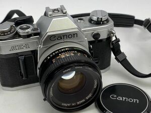 0102-1211S④579 Canon キヤノン/キャノン　AE-1　一眼レフカメラ　マニュアルフォーカス/レンズ FD 50mm 1:1.8 S.C./フィルター付き