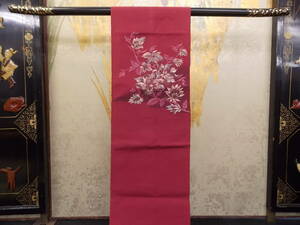 きもの今昔３１７７　名古屋帯　紬八寸かがり名古屋　あずき色地花柄　やや着用の痕跡が認められます