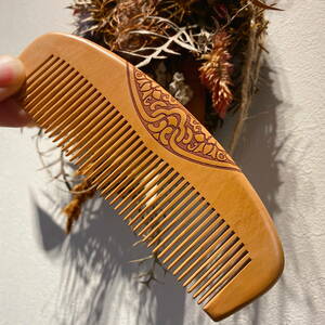 O type peach. tree sculpture ... up . except . comb comb brush 