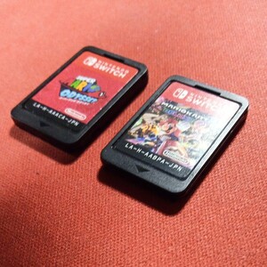 マリオカート8デラックス + スーパーマリオオデッセイ ソフトのみ 攻略本付 【新品の非売品ケース付き】