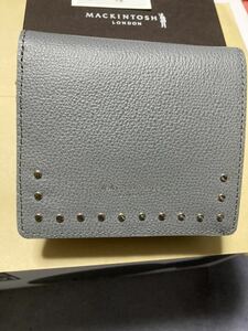  Macintosh London. gray color. folding purse unused.